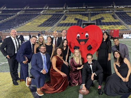 Dr. Erika Weil and team at UM game